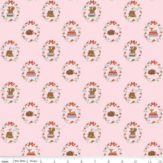 Image of Whimsical Woodland Animals Pink quilting cotton fabric by Tasha Noel for Riley Blake Designs. Features flowers and animals on a pink background. Cute Little Fabric Shop.
