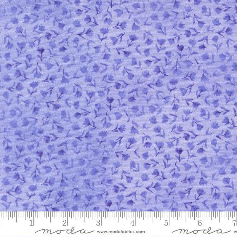 Image of Delphinium Small Floral Bluebell quilting cotton by Janet Clare for Moda Fabrics. Features flowers on a blue background. Cute Little Fabric Shop.