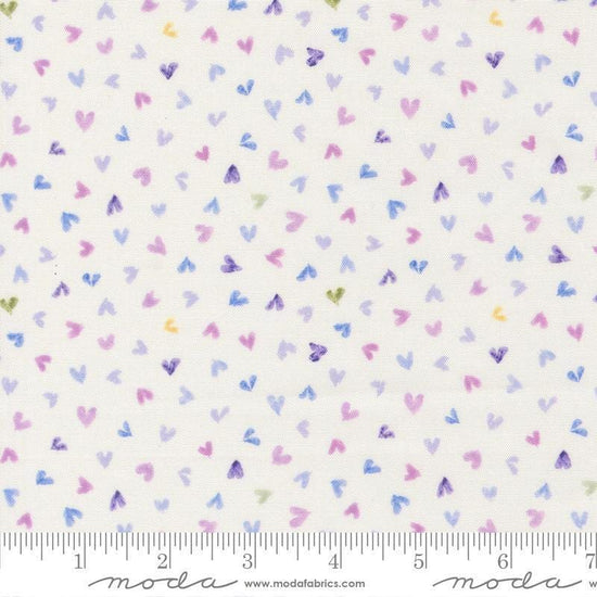 Image of Delphinium Hearts Snowdrop quilting cotton by Janet Clare for Moda Fabrics. Features hearts on a white background. Cute Little Fabric Shop.