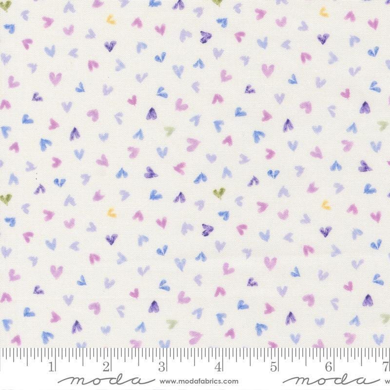 Image of Delphinium Hearts Snowdrop quilting cotton by Janet Clare for Moda Fabrics. Features hearts on a white background. Cute Little Fabric Shop.