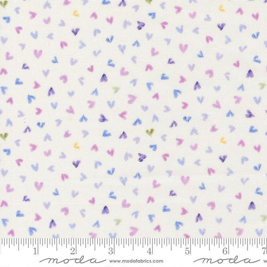 Image of Delphinium Hearts Snowdrop quilting cotton by Janet Clare for Moda Fabrics. Features hearts on a white background. Cute Little Fabric Shop.