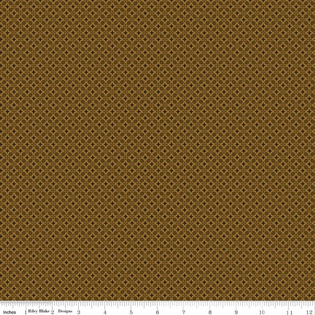 Image of Bountiful Geometric Suede quilting cotton fabric by Sandy Gervais for Riley Blake Designs. Features a geometric pattern on a brown background. Cute Little Fabric Shop.