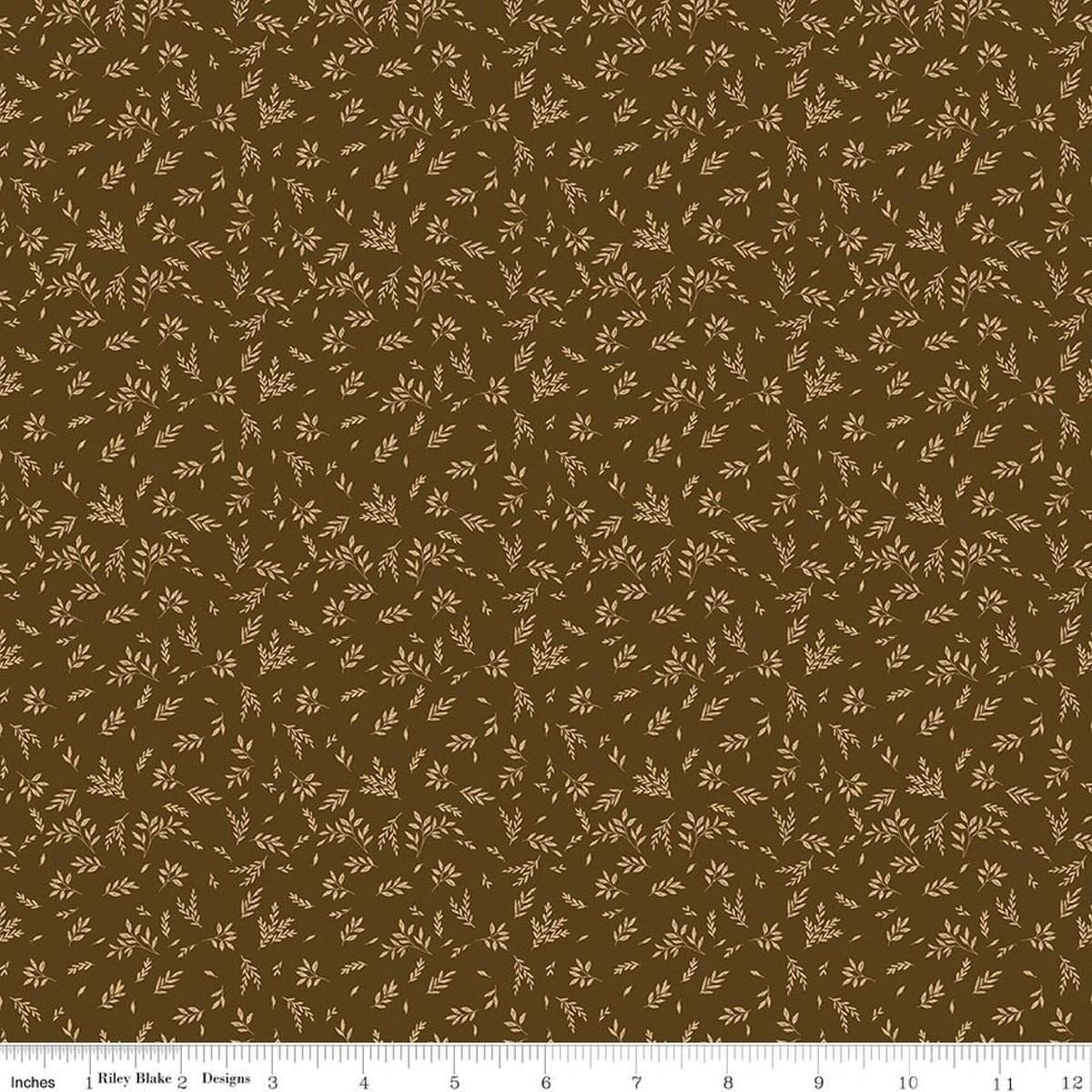 Image of Bountiful Leaves Brown quilting cotton fabric by Sandy Gervais for Riley Blake Designs. Features leaves on a brown background. Cute Little Fabric Shop.