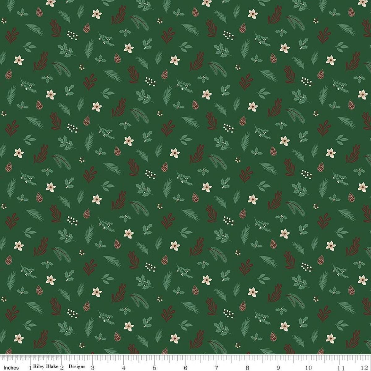 Image of Christmas Time Foliage Forest quilting cotton fabric by Dani Mogstad for Riley Blake Designs. Features leaves on a green background. Cute Little Fabric Shop.