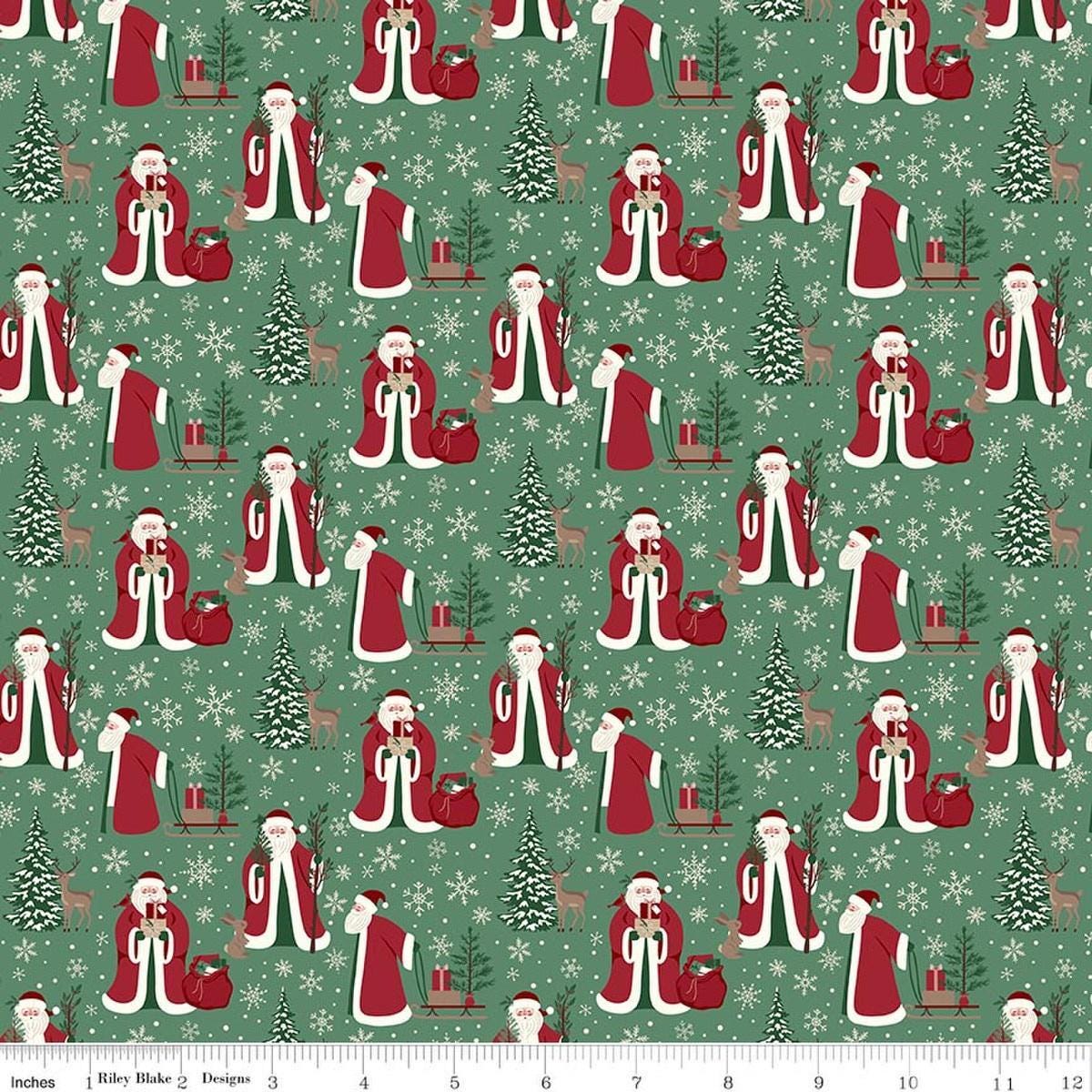 Image of Christmas Time Main Green quilting cotton fabric by Dani Mogstad for Riley Blake Designs. Features Santas on a green background. Cute Little Fabric Shop.
