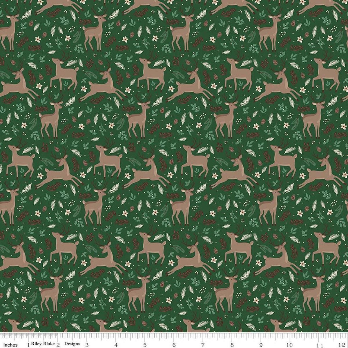 Image of Christmas Time Deer Forest quilting cotton fabric by Dani Mogstad for Riley Blake Designs. Features deer on a green background. Cute Little Fabric Shop.