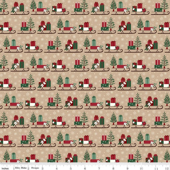 Image of Christmas Time Sleds Tan quilting cotton fabric by Dani Mogstad for Riley Blake Designs. Features presents on a tan background. Cute Little Fabric Shop.