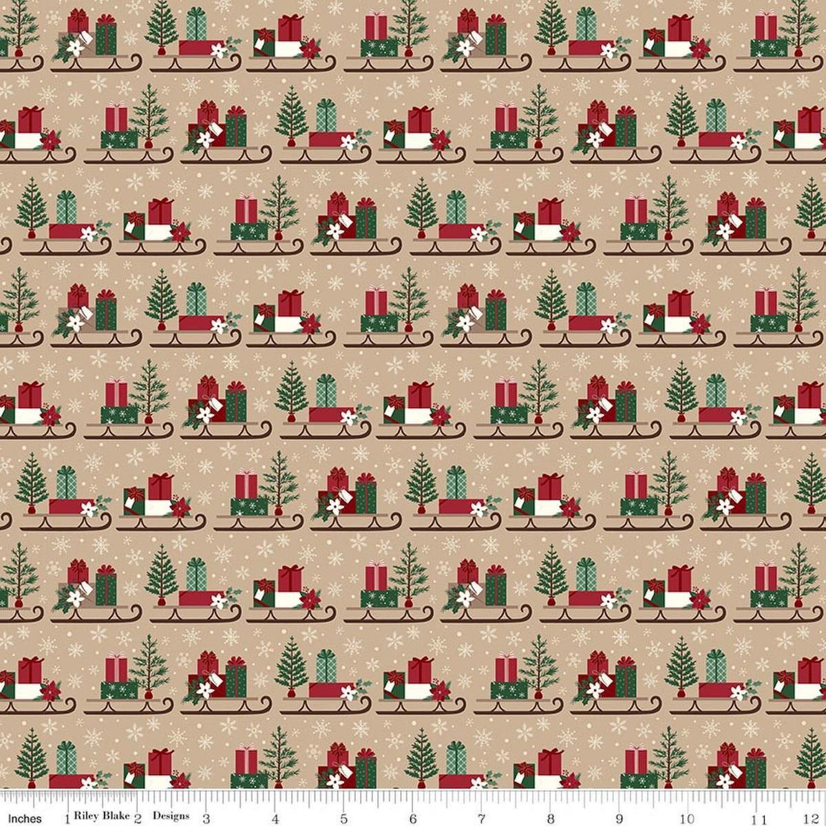 Image of Christmas Time Sleds Tan quilting cotton fabric by Dani Mogstad for Riley Blake Designs. Features presents on a tan background. Cute Little Fabric Shop.