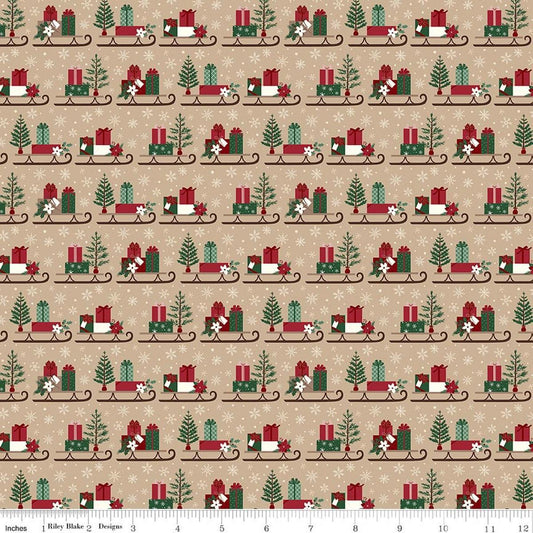 Image of Christmas Time Sleds Tan quilting cotton fabric by Dani Mogstad for Riley Blake Designs. Features presents on a tan background. Cute Little Fabric Shop.