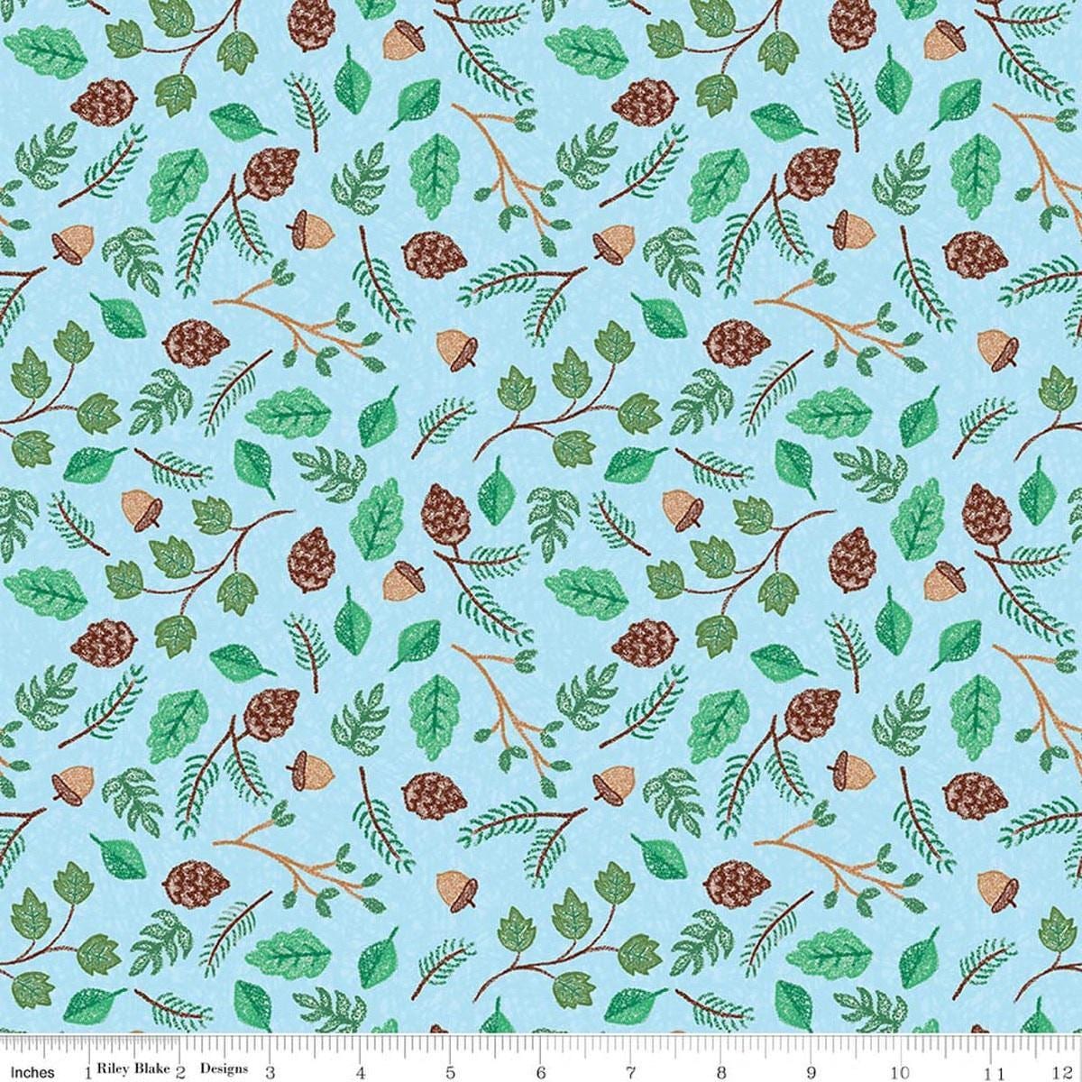 Image of Colorful Critters Botanical Blue Quilting Cotton Fabric by Official Licensed Product for Riley Blake Designs. Features leaves on a blue background. Cute Little Fabric Shop.