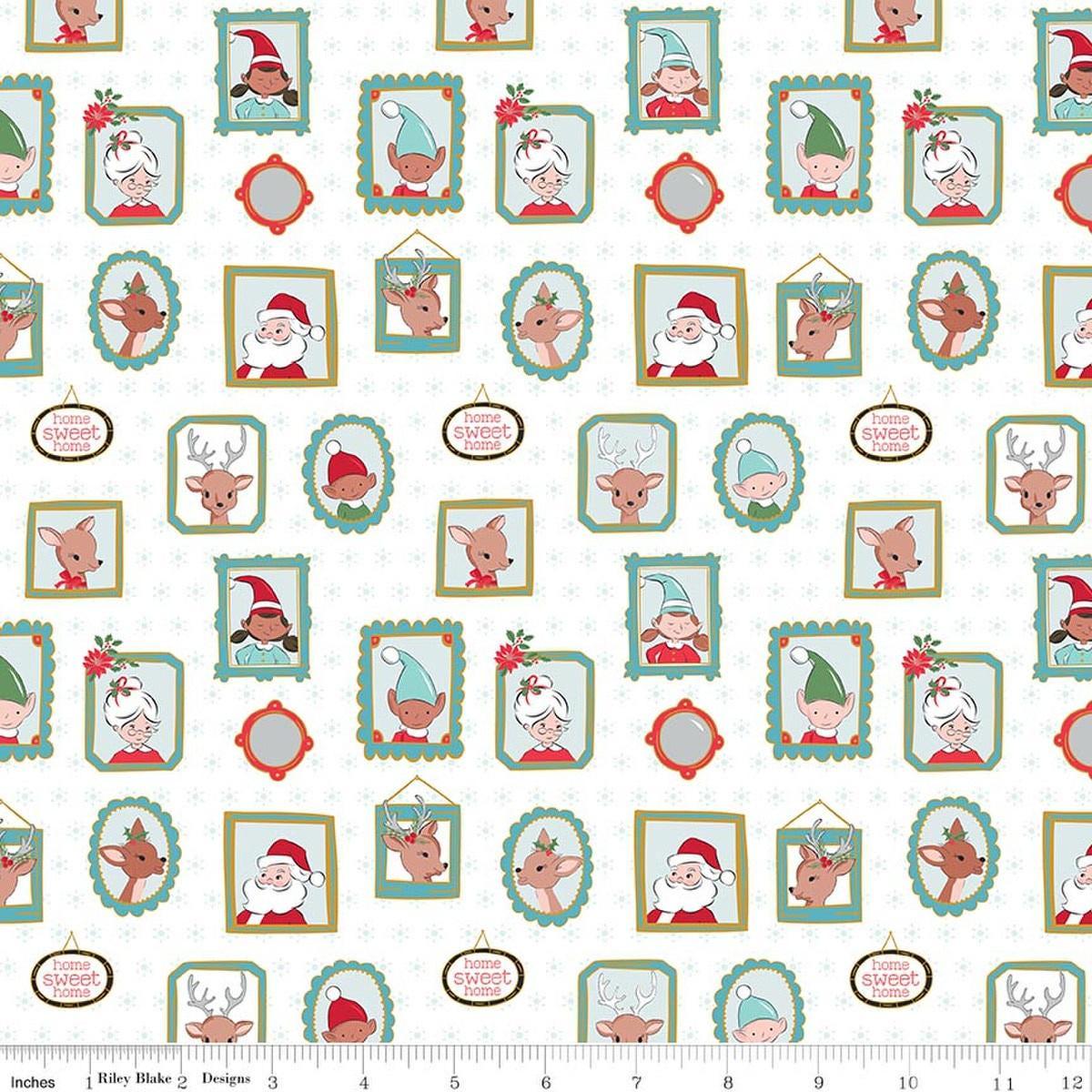 Image of Claus & Co. Wallpaper White Sparkle quilting cotton fabric by Melissa Mortenson for Riley Blake Designs. Features pictures on a white background. Cute Little Fabric Shop.