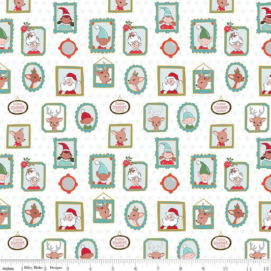 Image of Claus & Co. Wallpaper White Sparkle quilting cotton fabric by Melissa Mortenson for Riley Blake Designs. Features pictures on a white background. Cute Little Fabric Shop.