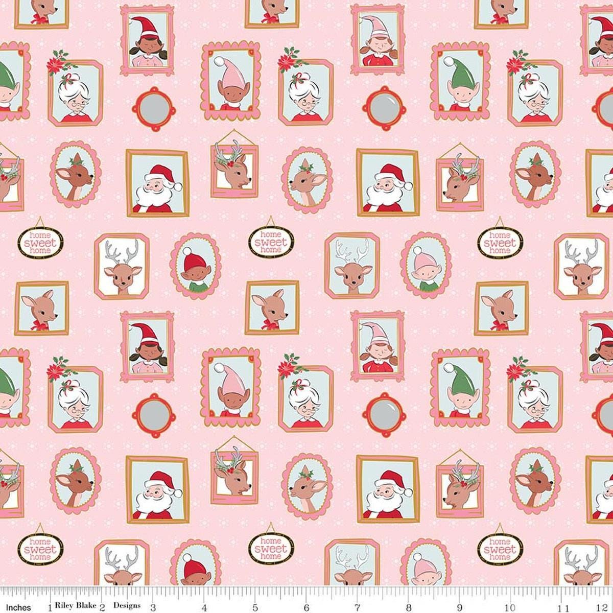 Image of Claus & Co. Wallpaper Pink Sparkle quilting cotton fabric by Melissa Mortenson for Riley Blake Designs. Features pictures on a pink background. Cute Little Fabric Shop.