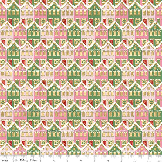 Image of Claus & Co. Christmas Houses Pink Sparkle quilting cotton fabric by Melissa Mortenson for Riley Blake Designs. Features houses on a pink background. Cute Little Fabric Shop.