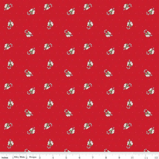 Image of Claus & Co. Candy Cane Toss Red quilting cotton fabric by Melissa Mortenson for Riley Blake Designs. Features candy canes on a red background. Cute Little Fabric Shop.