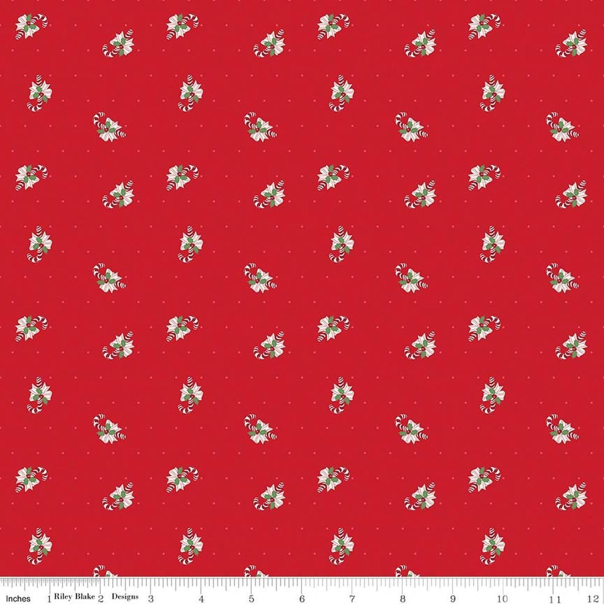 Image of Claus & Co. Candy Cane Toss Red quilting cotton fabric by Melissa Mortenson for Riley Blake Designs. Features candy canes on a red background. Cute Little Fabric Shop.