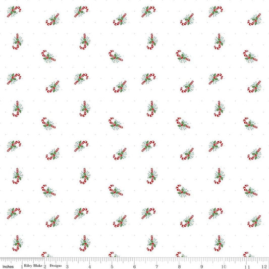 Image of Claus & Co. Candy Cane Toss White quilting cotton fabric by Melissa Mortenson for Riley Blake Designs. Features candy canes on a white background. Cute Little Fabric Shop.