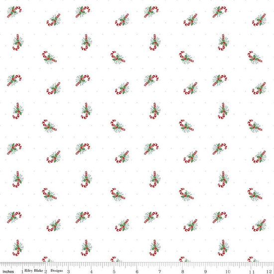 Image of Claus & Co. Candy Cane Toss White quilting cotton fabric by Melissa Mortenson for Riley Blake Designs. Features candy canes on a white background. Cute Little Fabric Shop.