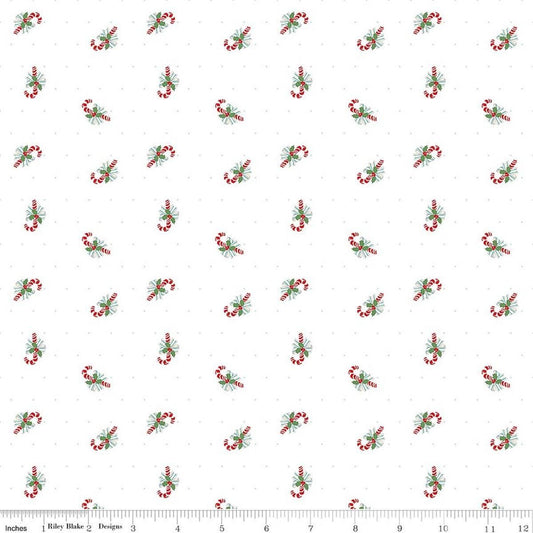 Image of Claus & Co. Candy Cane Toss White quilting cotton fabric by Melissa Mortenson for Riley Blake Designs. Features candy canes on a white background. Cute Little Fabric Shop.
