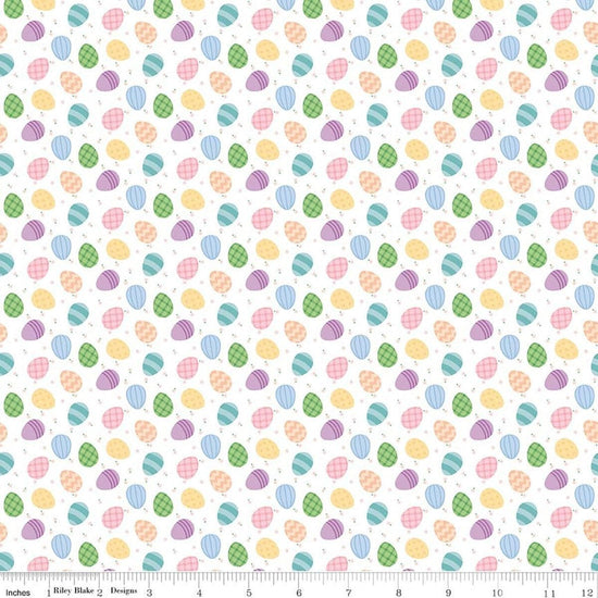 Image of Seasonal Basics Egg Toss White quilting cotton fabric by Christopher Thompson for Riley Blake Designs. Features eggs on a white background. Cute Little Fabric Shop.
