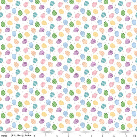 Image of Seasonal Basics Egg Toss White quilting cotton fabric by Christopher Thompson for Riley Blake Designs. Features eggs on a white background. Cute Little Fabric Shop.