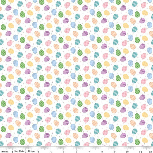 Image of Seasonal Basics Egg Toss White quilting cotton fabric by Christopher Thompson for Riley Blake Designs. Features eggs on a white background. Cute Little Fabric Shop.