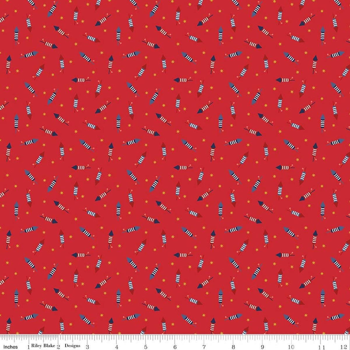 Image of Seasonal Basics Pop Boom Bang Red quilting cotton fabric by Christopher Thompson for Riley Blake Designs. Features fireworks on a red background. Cute Little Fabric Shop.