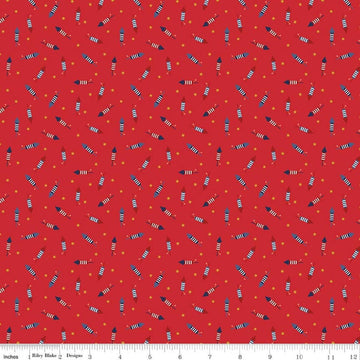 Image of Seasonal Basics Pop Boom Bang Red quilting cotton fabric by Christopher Thompson for Riley Blake Designs. Features fireworks on a red background. Cute Little Fabric Shop.