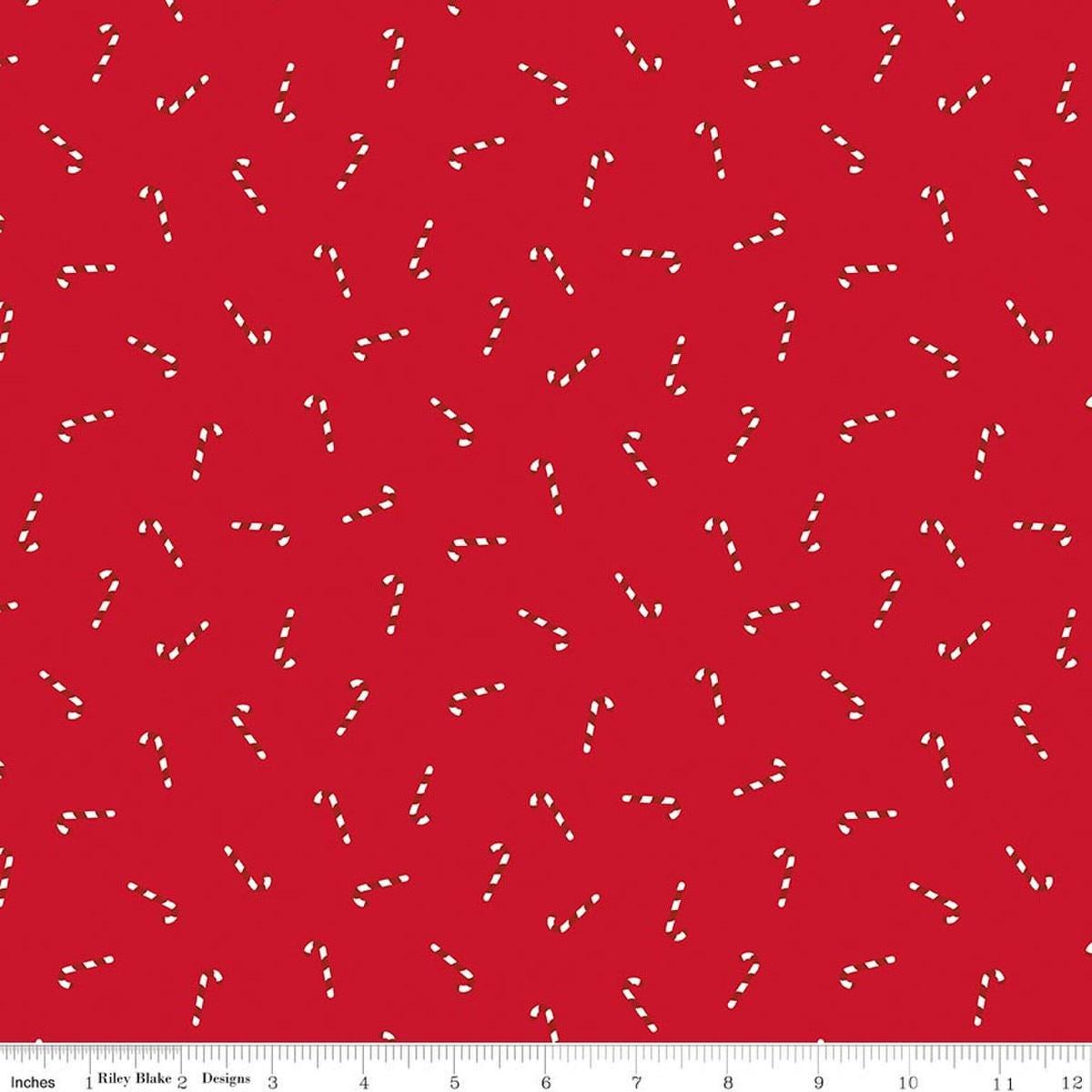 Image of Seasonal Basics Candy Canes Ren quilting cotton fabric by Christopher Thompson for Riley Blake Designs. Features candy canes on a red background. Cute Little Fabric Shop.