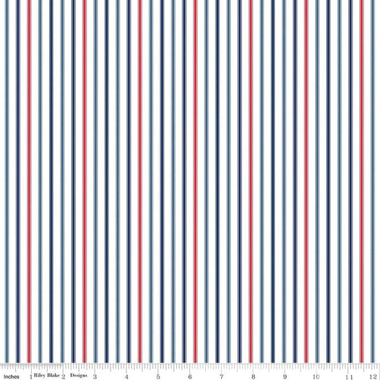 Image of Seasonal Basics Ticking Stripe Patriotic quilting cotton fabric by Christopher Thompson for Riley Blake Designs. Features stripes on a blue background. Cute Little Fabric Shop.