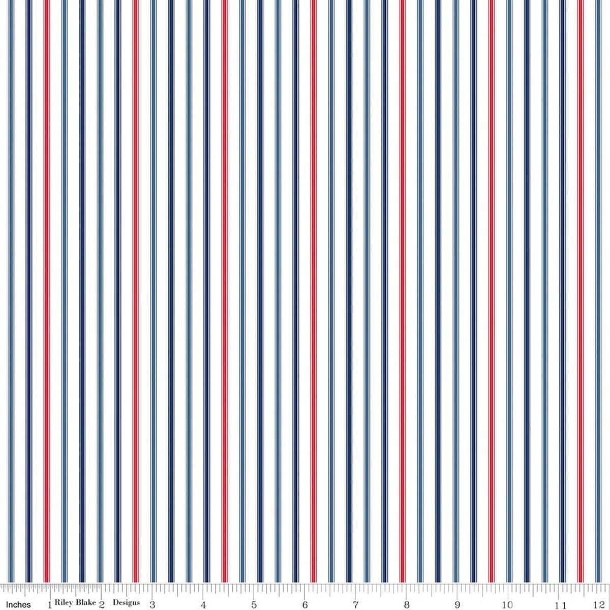 Image of Seasonal Basics Ticking Stripe Patriotic quilting cotton fabric by Christopher Thompson for Riley Blake Designs. Features stripes on a blue background. Cute Little Fabric Shop.
