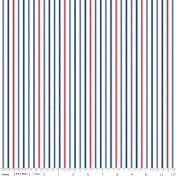 Image of Seasonal Basics Ticking Stripe Patriotic quilting cotton fabric by Christopher Thompson for Riley Blake Designs. Features stripes on a blue background. Cute Little Fabric Shop.