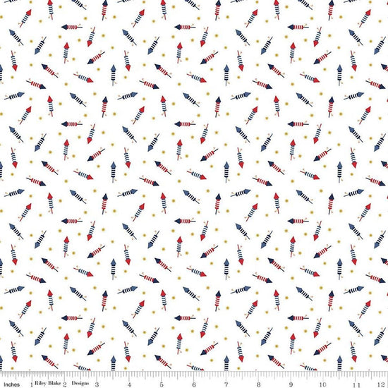 Image of Seasonal Basics Pop Boom Bang White quilting cotton fabric by Christopher Thompson for Riley Blake Designs. Features fireworks on a white background. Cute Little Fabric Shop.