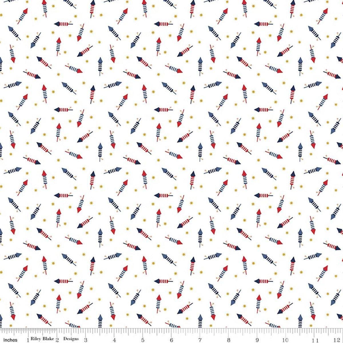 Image of Seasonal Basics Pop Boom Bang White quilting cotton fabric by Christopher Thompson for Riley Blake Designs. Features fireworks on a white background. Cute Little Fabric Shop.