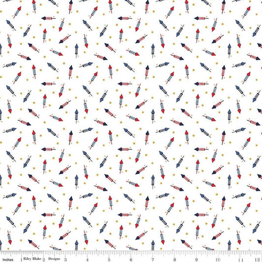 Image of Seasonal Basics Pop Boom Bang White quilting cotton fabric by Christopher Thompson for Riley Blake Designs. Features fireworks on a white background. Cute Little Fabric Shop.