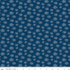 Image of Seasonal Basics Fireworks Denim quilting cotton fabric by Christopher Thompson for Riley Blake Designs. Features fireworks on a blue background. Cute Little Fabric Shop.