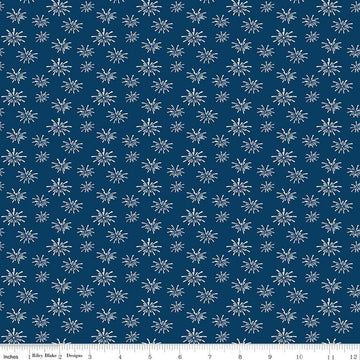 Image of Seasonal Basics Fireworks Denim quilting cotton fabric by Christopher Thompson for Riley Blake Designs. Features fireworks on a blue background. Cute Little Fabric Shop.