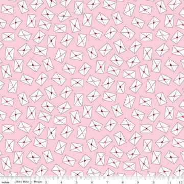 Image of Seasonal Basics Love Notes Pink quilting cotton fabric by Christopher Thompson for Riley Blake Designs. Features envelopes on a pink background. Cute Little Fabric Shop.
