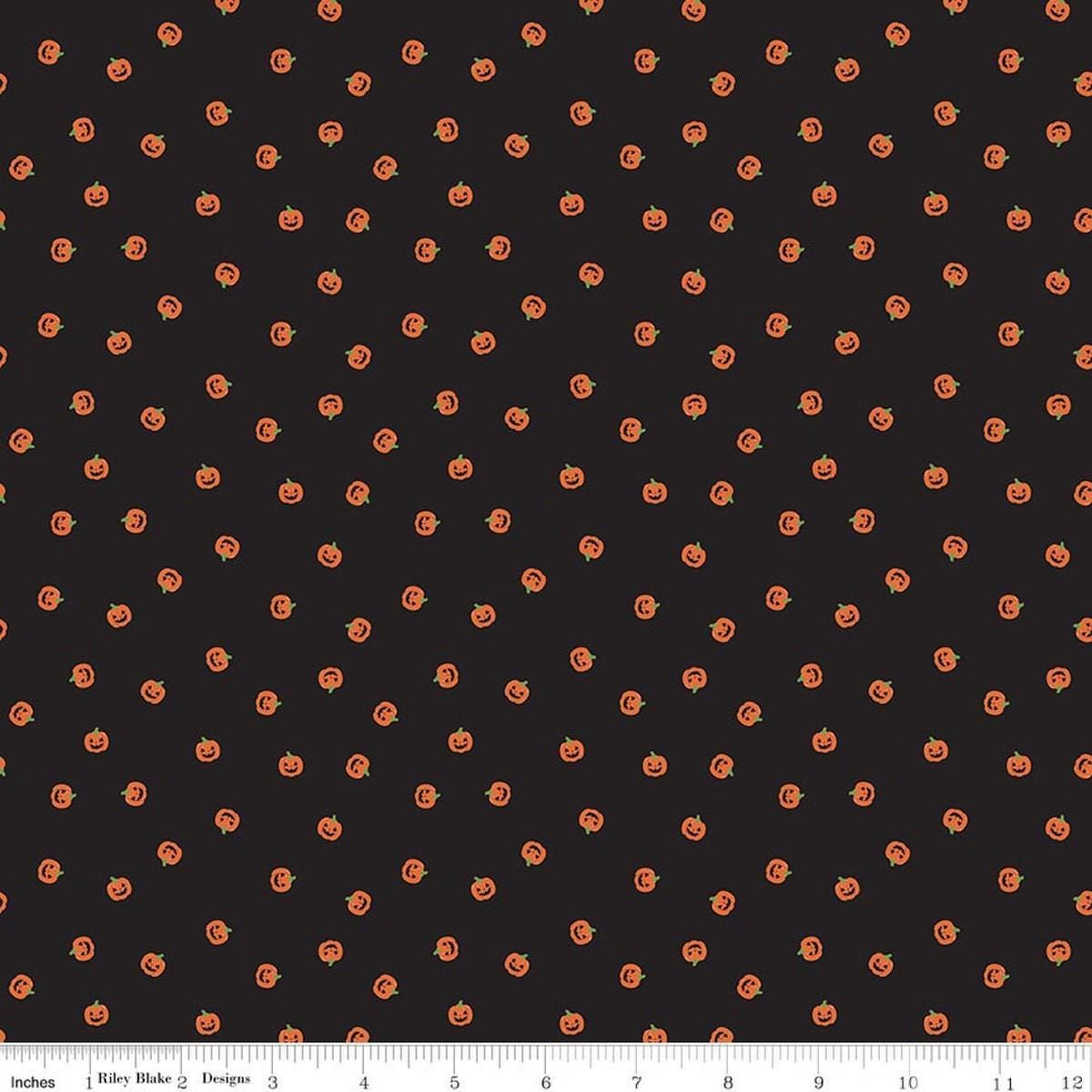 Image of Seasonal Basics Jacks Black quilting cotton fabric by Christopher Thompson for Riley Blake Designs. Features pumpkins on a black background. Cute Little Fabric Shop.