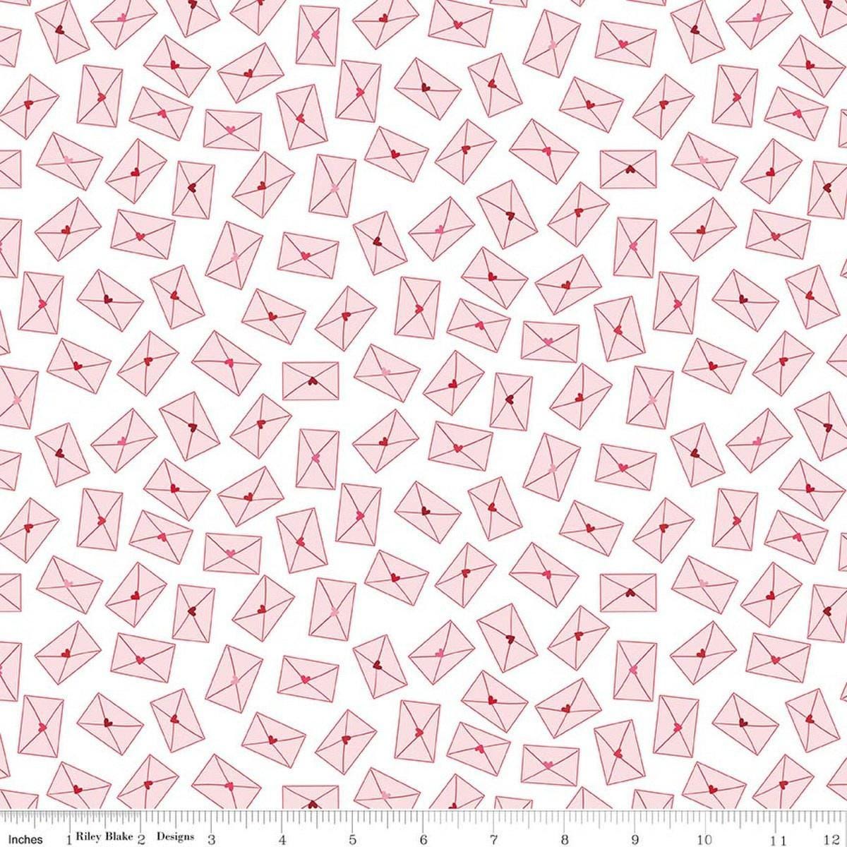 Image of Seasonal Basics Love Notes White quilting cotton fabric by Christopher Thompson for Riley Blake Designs. Features envelopes on a white background. Cute Little Fabric Shop.