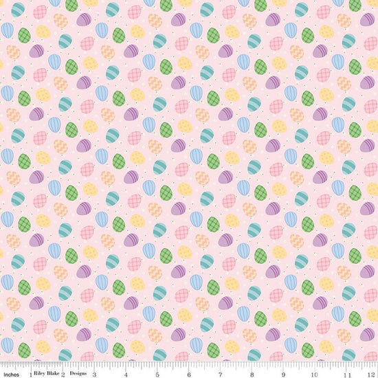 Image of Seasonal Basics Egg Toss Pink quilting cotton fabric by Christopher Thompson for Riley Blake Designs. Features eggs on a pink background. Cute Little Fabric Shop.