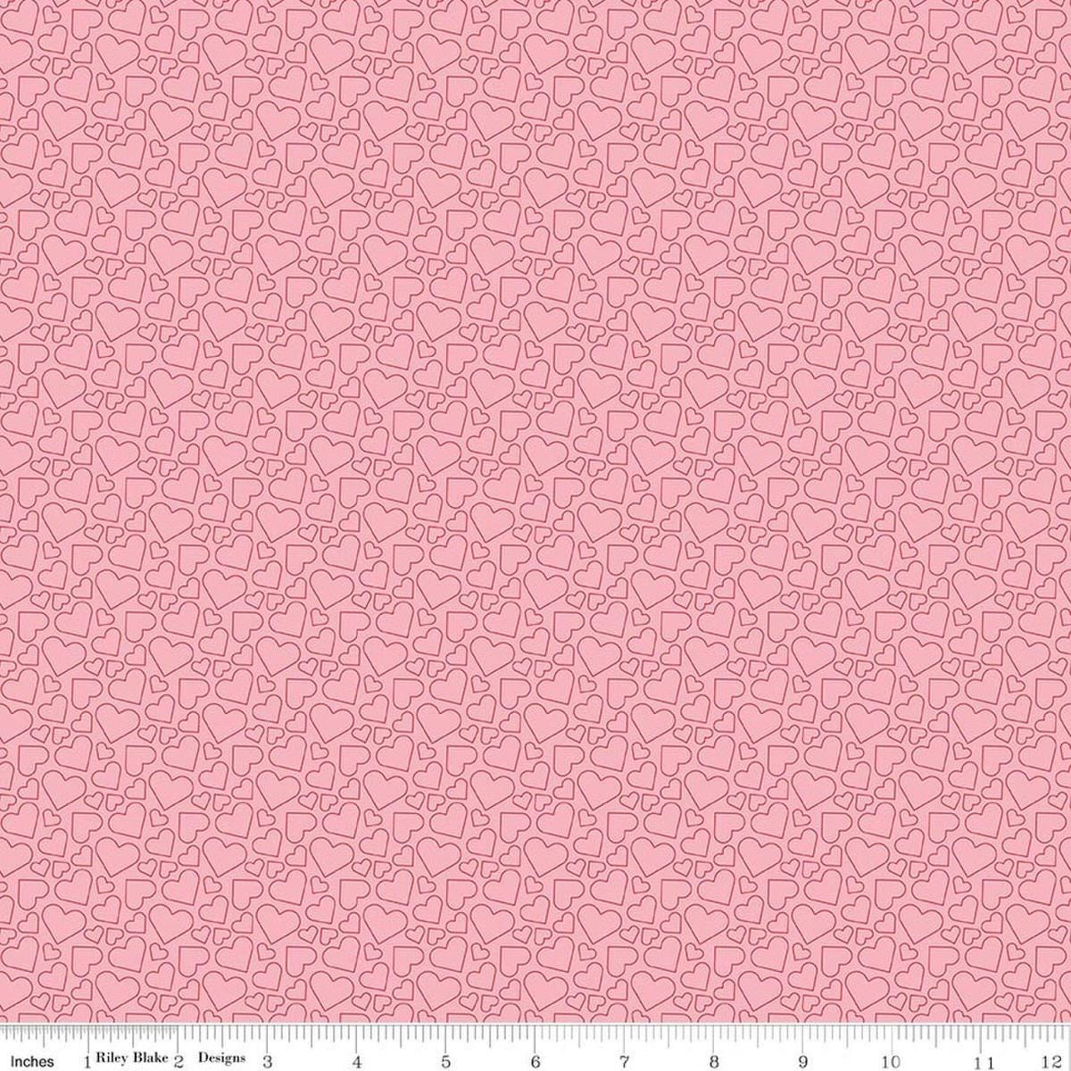 Image of Seasonal Basics Heart Outlines Pink quilting cotton fabric by Christopher Thompson for Riley Blake Designs. Features hearts on a pink background. Cute Little Fabric Shop.