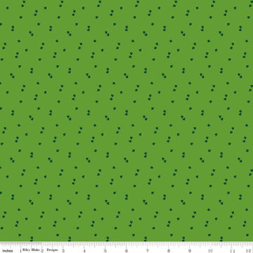Image of Seasonal Basics Clovers Holly quilting cotton fabric by Christopher Thompson for Riley Blake Designs. Features clovers on a green background. Cute Little Fabric Shop.