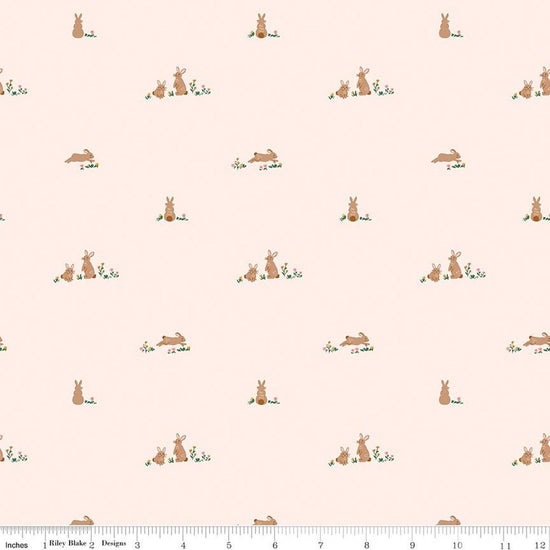 Image of Designer Flannel Sweet Cotton Tales Flopsy Fields Blush quilting cotton fabric by Little Forest Atelier for RIley Blake Designs. Features bunnies on a cream background. Cute Little Fabric Shop.