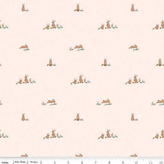 Image of Designer Flannel Sweet Cotton Tales Flopsy Fields Blush quilting cotton fabric by Little Forest Atelier for RIley Blake Designs. Features bunnies on a cream background. Cute Little Fabric Shop.