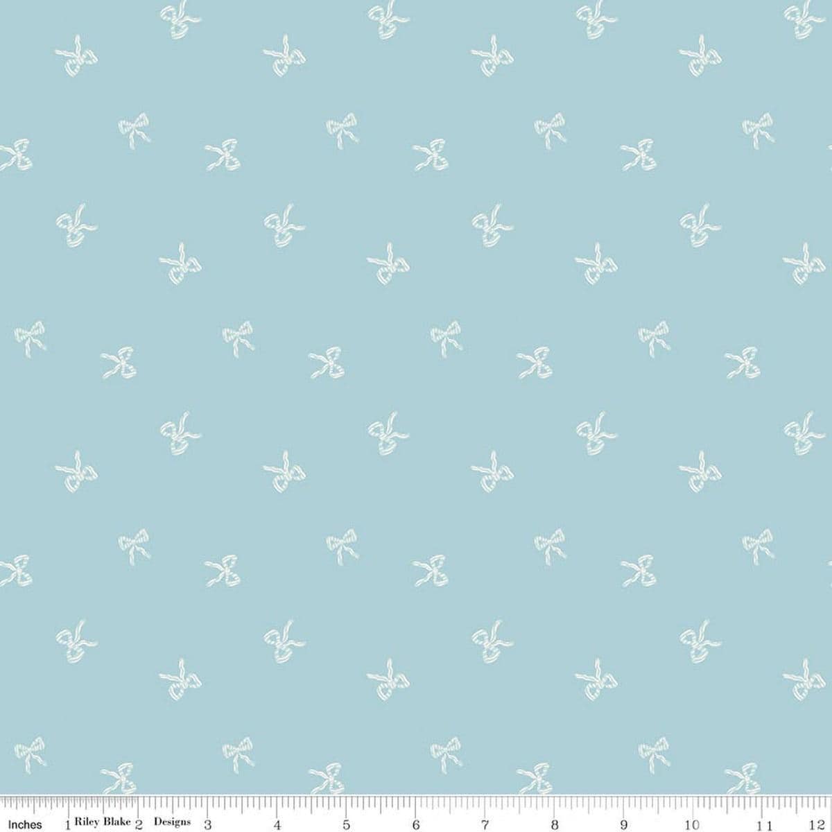 Image of Designer Flannel Sweet Cotton Tales Bows Blue quilting cotton fabric by Little Forest Atelier for RIley Blake Designs. Features bows on a blue background. Cute Little Fabric Shop.