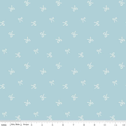 Image of Designer Flannel Sweet Cotton Tales Bows Blue quilting cotton fabric by Little Forest Atelier for RIley Blake Designs. Features bows on a blue background. Cute Little Fabric Shop.