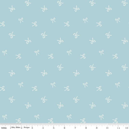 Image of Designer Flannel Sweet Cotton Tales Bows Blue quilting cotton fabric by Little Forest Atelier for RIley Blake Designs. Features bows on a blue background. Cute Little Fabric Shop.
