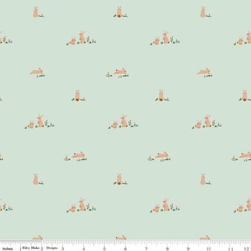 Image of Designer Flannel Sweet Cotton Tales Flopsy Fields Mint quilting cotton fabric by Little Forest Atelier for RIley Blake Designs. Features bunnies on a green background. Cute Little Fabric Shop.