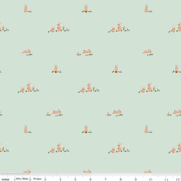 Image of Designer Flannel Sweet Cotton Tales Flopsy Fields Mint quilting cotton fabric by Little Forest Atelier for RIley Blake Designs. Features bunnies on a green background. Cute Little Fabric Shop.